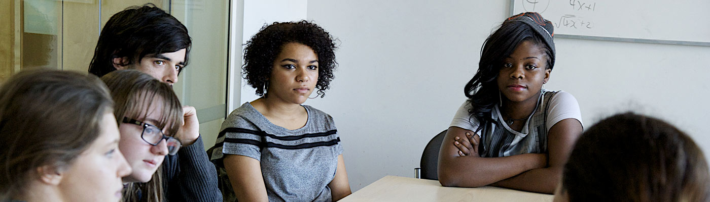 teenagers around classroom table